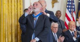 President Joe Biden puts the Presidential Medal of Freedom around the neck of chef and humanitarian José Andrés, who founded the Global Food Institute at GW. (White House photo)